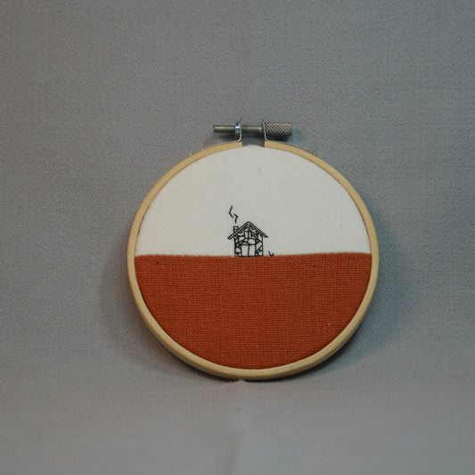 Petite broderie "Au coin du feu"